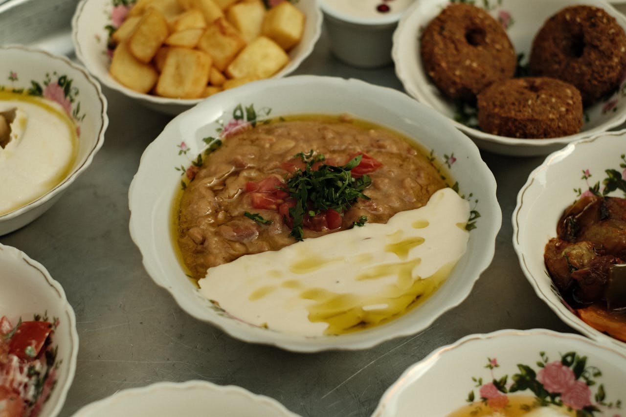 A delicious spread of Arabian foods, featuring classics like hummus and falafel